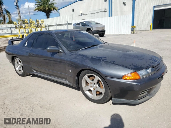 1990 Nissan Skyline z VIN BNR32010431, wystawiony jako Copart lot #78496994 z przebiegiem 182 401 mil mil oraz Nie do naprawy • Non repairable. Historia ofert i sprzedaży dostępna na DreamBid. Obrazek 4.