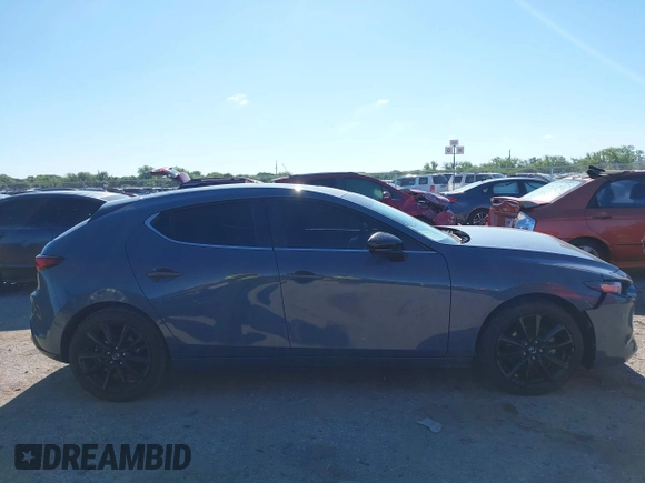 2023 Mazda 3 S Carbon Edition with VIN JM1BPBLM8P1611106, listed as a IAAI auction lot 42191902 with 37,244 mi miles and . Bid and sale history available at DreamBid. Image 13.
