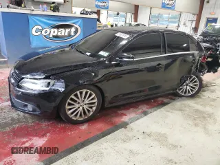 2014 Volkswagen Jetta SEL z VIN 3VWL17AJ2EM256765, wystawiony jako Copart lot #57861815 z przebiegiem 123 800 mil mil oraz Szkoda całkowita • Salvage title. Historia ofert i sprzedaży dostępna na DreamBid. Obrazek 1.
