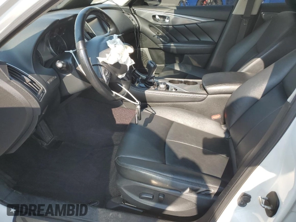 2015 Infiniti Q50 Premium with VIN JN1BV7AR6FM396021, listed as a Copart auction lot 63149485 with 71,862 mi miles and Salvage title. Bid and sale history available at DreamBid. Image 7.