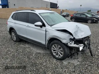 2018 Volkswagen Tiguan S with VIN 3VV1B7AXXJM067370, listed as a Copart auction lot 53645945 with 143,137 mi miles and Salvage title. Bid and sale history available at DreamBid. Image 4.