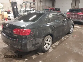 2012 Volkswagen Jetta TDI with VIN 3VWLL7AJXCM031579, listed as a IAAI auction lot 41227325 with 123,273 mi miles and . Bid and sale history available at DreamBid. Image 4.
