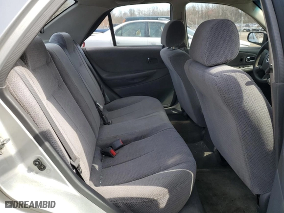 2000 Mazda Protege DX with VIN JM1BJ222XY0199683, listed as a Copart auction lot 50010565 with 139,428 mi miles and Salvage Title. Bid and sale history available at carsss.com. Image 10.