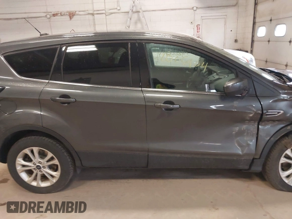 2017 Ford Escape SE with VIN 1FMCU9G90HUC96633, listed as a IAAI auction lot 42005904 with 93,139 mi miles. Bid and sale history available at carsss.com. Image 13.