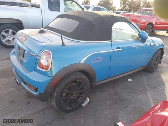 2013 MINI Cooper Roadster S with VIN WMWSY3C55DT594628, listed as a IAAI auction lot 41316950 with NaN miles. Bid and sale history available at carsss.com. Image 4.