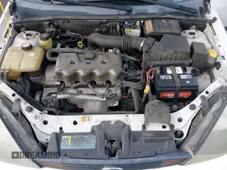 2003 Ford Focus LX with VIN 1FAFP33P73W156382, listed as a IAAI auction lot 41591885 with 174,169 mi miles and . Bid and sale history available at carsss.com. Image 10.