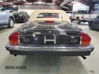 1988 Jaguar XJS z VIN SAJNV5843JC147927, wystawiony jako Copart lot #58988575 z przebiegiem 81 239 mil mil oraz Tytuł czysty. Historia ofert i sprzedaży dostępna na DreamBid. Obrazek 6.
