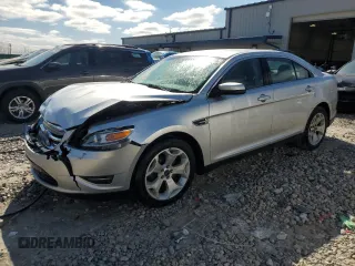 2012 Ford Taurus SEL z VIN 1FAHP2HW7CG138459, wystawiony jako Copart lot #53170075 z przebiegiem 194 617 mil mil oraz Czysty tytuł • Clean title. Historia ofert i sprzedaży dostępna na DreamBid. Obrazek 1.