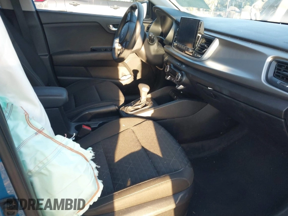 2022 Kia Rio S with VIN 3KPA25AD6NE483733, listed as a IAAI auction lot 41850498 with 50,035 mi miles and . Bid and sale history available at DreamBid. Image 5.
