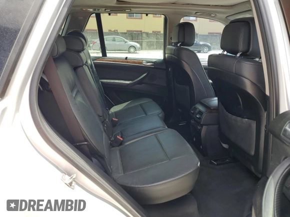 2013 BMW X5 xDrive35i z VIN 5UXZV4C5XD0B03182, wystawiony jako Copart lot #54906305 z przebiegiem 166 493 mil mil oraz Szkody całkowita. Historia ofert i sprzedaży dostępna na DreamBid. Obrazek 11.