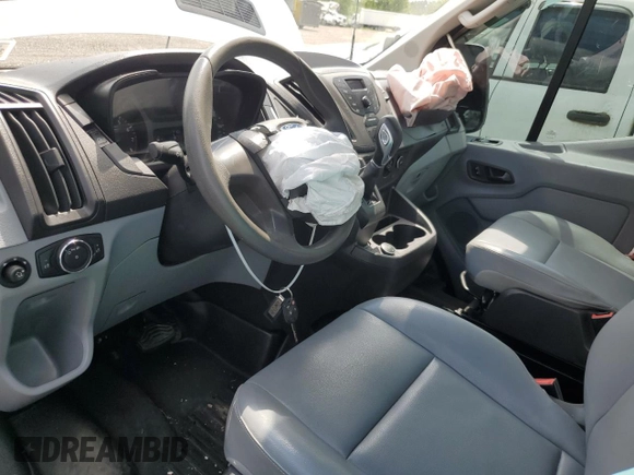 2018 Ford Transit z VIN 1FTYR2CMXJKA85664, wystawiony jako Copart lot #62708365 z przebiegiem Nie podano mil oraz Szkoda całkowita • Salvage title. Historia ofert i sprzedaży dostępna na DreamBid. Obrazek 8.