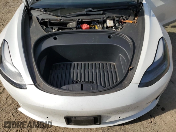 2021 Tesla Model 3 Standard Range Plus z VIN 5YJ3E1EAXMF870285, wystawiony jako Copart lot #53251375 z przebiegiem 64 085 mil mil oraz Szkody całkowita. Historia ofert i sprzedaży dostępna na DreamBid. Obrazek 11.