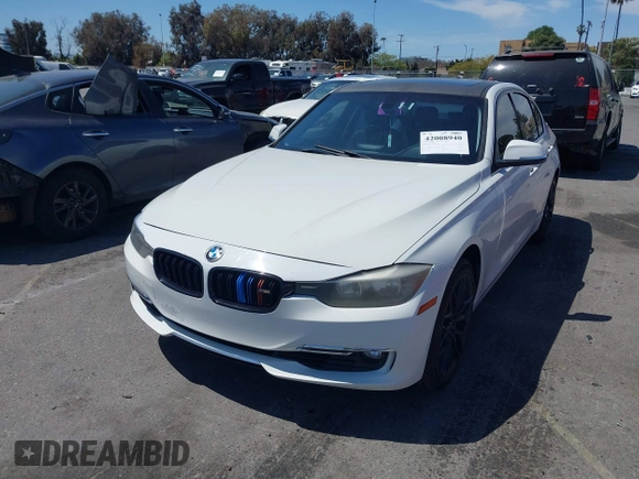 2012 BMW 3 Series 328i with VIN WBA3A5C50CF342206, listed as a IAAI auction lot 42008940 with 130,164 mi miles. Bid and sale history available at carsss.com. Image 2.