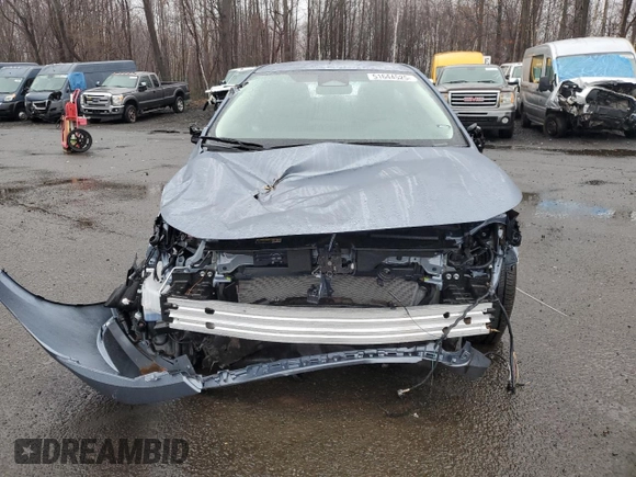 2024 Toyota Corolla LE with VIN 5YFB4MDE7RP112243, listed as a Copart auction lot 51644525 with 6,021 mi miles and Salvage Title. Bid and sale history available at carsss.com. Image 5.