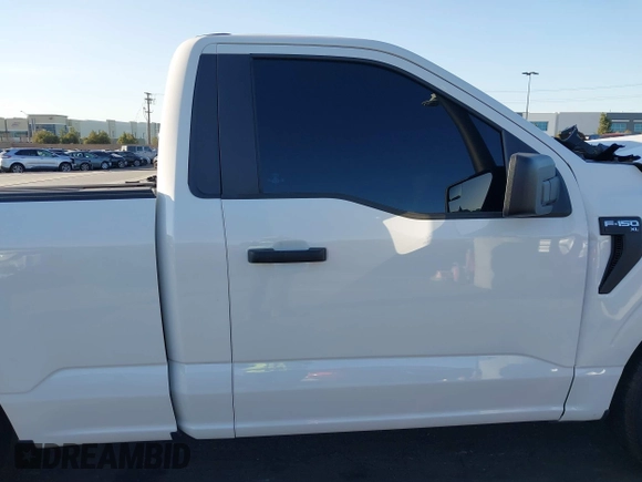 2023 Ford F-150 XL with VIN 1FTMF1C52PKF67726, listed as a IAAI auction lot 41611798 with 15,015 mi miles and . Bid and sale history available at carsss.com. Image 14.