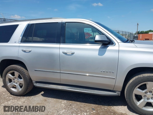 2015 Chevrolet Tahoe LT with VIN 1GNSCBKC9FR223426, listed as a IAAI auction lot 42352698 with 128,339 mi miles and . Bid and sale history available at DreamBid. Image 13.