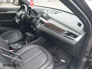 2017 BMW X1 xDrive28i with VIN WBXHT3C37H5F86637, listed as a IAAI auction lot 41300161 with 95,459 mi miles. Bid and sale history available at carsss.com. Image 5.