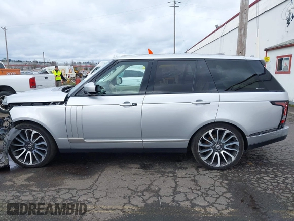 2015 Land Rover Range Rover HSE z VIN SALGS2VF6FA204430, wystawiony jako IAAI lot #41912280 z przebiegiem 82 812 mil mil oraz . Historia ofert i sprzedaży dostępna na DreamBid. Obrazek 14.