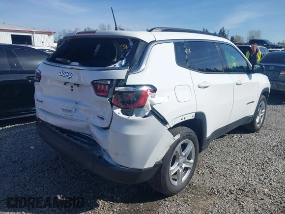2023 Jeep Compass Latitude with VIN 3C4NJDBN7PT561666, listed as a IAAI auction lot 41956815 with 49,392 mi miles and . Bid and sale history available at DreamBid. Image 4.