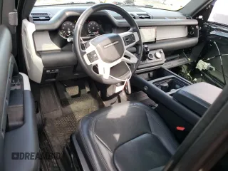2023 Land Rover Defender S with VIN SALEJ6EX0P2173858, listed as a Copart auction lot 52773365 with 30,768 mi miles and Salvage title. Bid and sale history available at DreamBid. Image 8.