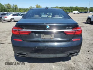2017 BMW 7 Series 740i xDrive with VIN WBA7E4C54HGU99710, listed as a Copart auction lot 69572544 with 0 mi miles and Salvage Title. Bid and sale history available at carsss.com. Image 6.
