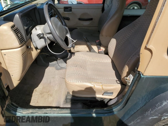 1999 Jeep Wrangler Sport with VIN 1J4FY19S2XP446059, listed as a Copart auction lot 51246105 with 183,072 mi miles and Clean Title. Bid and sale history available at carsss.com. Image 7.