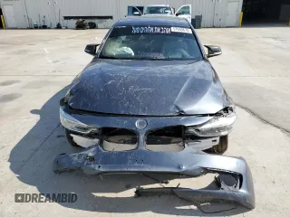 2012 BMW 3 Series 335i with VIN WBA3A9C5XCF474803, listed as a Copart auction lot 57940675 with 121,960 mi miles and Salvage title. Bid and sale history available at DreamBid. Image 5.