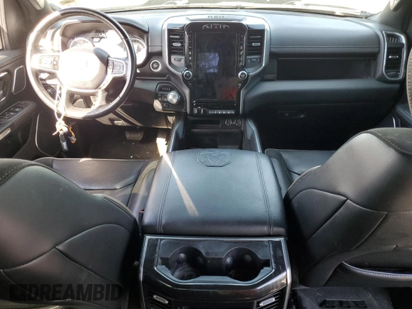 2021 Ram 1500 Laramie with VIN 1C6SRFJT3MN677537, listed as a Copart auction lot 57936295 with Not provided miles and Salvage title. Bid and sale history available at DreamBid. Image 8.
