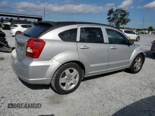 2009 Dodge Caliber SXT with VIN 1B3HB48AX9D157186, listed as a Copart auction lot 52892065 with 218,024 mi miles and Salvage Title. Bid and sale history available at carsss.com. Image 3.