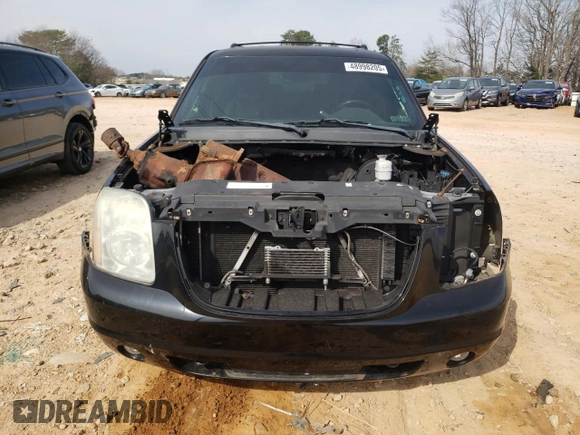 2011 GMC Yukon Denali with VIN 1GKS2EEF3BR137742, listed as a Copart auction lot 48998205 with Not Provided miles and Salvage Title. Bid and sale history available at DreamBid. Image 5.