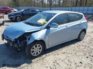 2014 Hyundai Accent GS with VIN KMHCT5AE1EU187112, listed as a IAAI auction lot 41894869 with 100,640 mi miles. Bid and sale history available at carsss.com. Image 2.