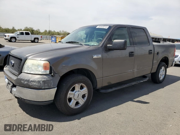 2004 Ford F-150 XLT with VIN 1FTRW12W74KC26169, listed as a Copart auction lot 68393914 with 118,059 mi miles and Salvage Title. Bid and sale history available at DreamBid. Image 1.