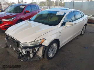 2015 Ford Fusion Energi SE Luxury with VIN 3FA6P0PU6FR205528, listed as a IAAI auction lot 41252552 with 157,302 mi miles. Bid and sale history available at carsss.com. Image 18.