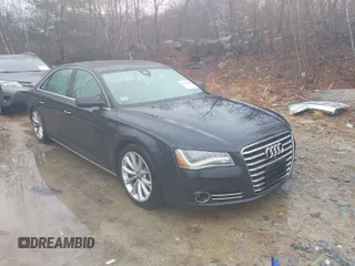 2014 Audi A8 3.0T z VIN WAURGAFD6EN002930, wystawiony jako IAAI lot #41915290 z przebiegiem 144 742 mil mil oraz . Historia ofert i sprzedaży dostępna na DreamBid. Obrazek 1.
