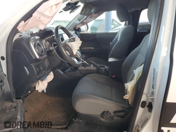 2023 Toyota Tacoma SR with VIN 3TYSX5EN3PT018395, listed as a Copart auction lot 48757055 with 28,002 mi miles and Salvage title. Bid and sale history available at DreamBid. Image 7.