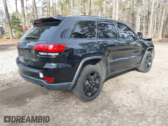 2018 Jeep Grand Cherokee Laredo E with VIN 1C4RJFAG1JC426542, listed as a IAAI auction lot 41729268 with 106,024 mi miles and . Bid and sale history available at DreamBid. Image 4.