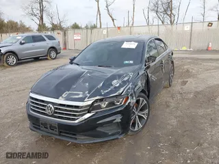 2021 Volkswagen Passat 2.0T SE with VIN 1VWSA7A34MC019031, listed as a IAAI auction lot 41150221 with 50,796 mi miles. Bid and sale history available at carsss.com. Image 6.