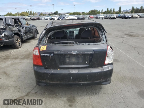 2005 Kia Spectra with VIN KNAFE162655074198, listed as a Copart auction lot 71015104 with 200,819 mi miles and Salvage Title. Bid and sale history available at DreamBid. Image 6.