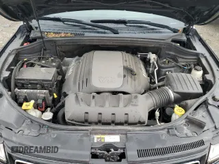2015 Jeep Grand Cherokee Overland with VIN 1C4RJFCT2FC762573, listed as a Copart auction lot 59123275 with 229,128 mi miles and Salvage title. Bid and sale history available at DreamBid. Image 11.