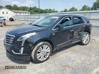 2019 Cadillac XT5 Premium Luxury AWD with VIN 1GYKNFRS9KZ223065, listed as a Copart auction lot 60902645 with 101,168 mi miles and Salvage title. Bid and sale history available at DreamBid. Image 1.