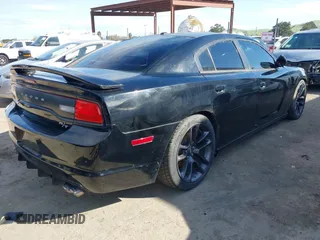 2013 Dodge Charger RT with VIN 2C3CDXCT2DH503048, listed as a IAAI auction lot 41856741 with 88,750 mi miles and . Bid and sale history available at carsss.com. Image 4.