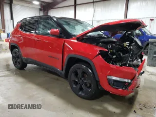 2020 Jeep Compass Latitude with VIN 3C4NJDBB2LT116591, listed as a Copart auction lot 52180045 with 138,531 mi miles and Salvage Title. Bid and sale history available at DreamBid. Image 4.