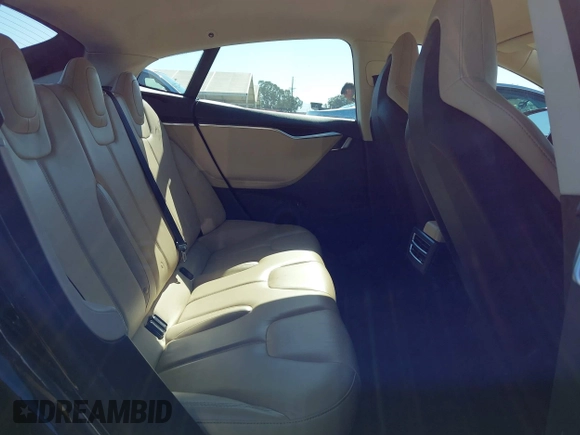 2013 Tesla Model S with VIN 5YJSA1CNXDFP28192, listed as a IAAI auction lot 42227521 with 60,967 mi miles and . Bid and sale history available at DreamBid. Image 8.