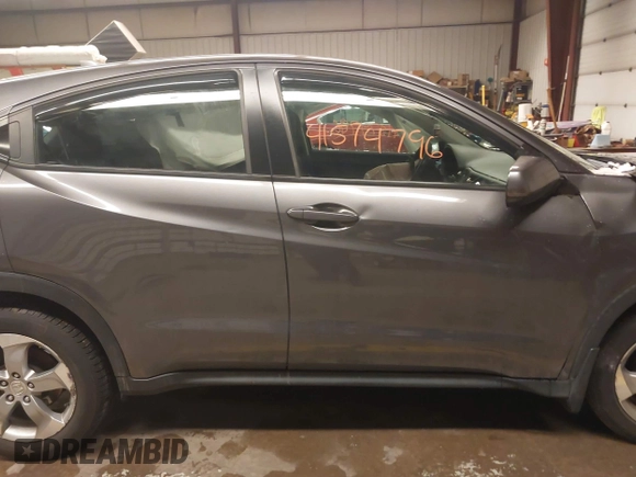 2018 Honda HR-V LX with VIN 3CZRU6H35JM704037, listed as a IAAI auction lot 41574796 with 140,671 mi miles. Bid and sale history available at carsss.com. Image 14.