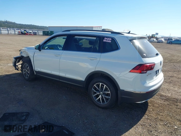 2020 Volkswagen Tiguan SE with VIN 3VV2B7AXXLM053170, listed as a IAAI auction lot 42203372 with 112,794 mi miles and . Bid and sale history available at DreamBid. Image 3.