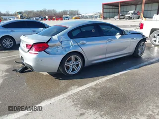 2015 BMW 6 Series 640i xDrive with VIN WBA6B8C52FD453433, listed as a IAAI auction lot 41805317 with 138,685 mi miles and . Bid and sale history available at carsss.com. Image 4.