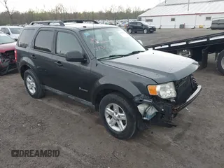 2010 Ford Escape Hybrid with VIN 1FMCU4K33AKB08615, listed as a IAAI auction lot 42093889 with 155,064 mi miles and . Bid and sale history available at DreamBid. Image 1.