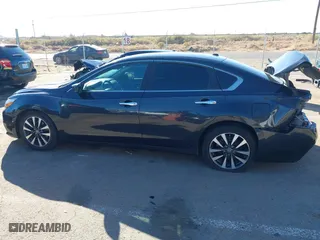 2017 Nissan Altima 2.5 SV with VIN 1N4AL3AP0HC277398, listed as a IAAI auction lot 40918944 with 214,412 mi miles. Bid and sale history available at carsss.com. Image 15.