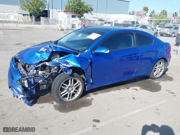 2006 Scion tC with VIN JTKDE167560136252, listed as a IAAI auction lot 42000724 with 168,727 mi miles. Bid and sale history available at carsss.com. Image 2.