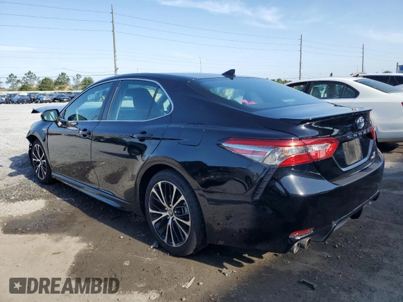 2019 Toyota Camry Hybrid LE z VIN 4T1B21HK1KU516390, wystawiony jako Copart lot #54856015 z przebiegiem 94 504 mil mil oraz Nie do naprawy • Non repairable. Historia ofert i sprzedaży dostępna na DreamBid. Obrazek 2.